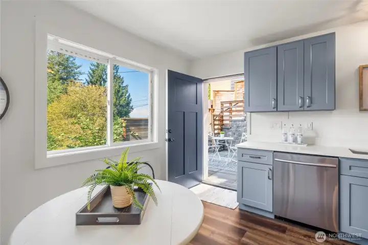 Lower level with separate entry with full kitchen offers options for rental or generational living accommodations.