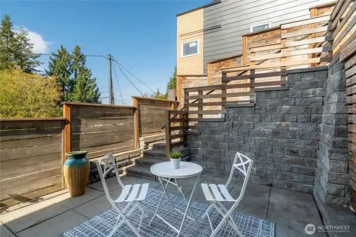 Lower level patio with privacy.
