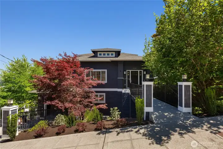 Classic Craftsman influenced architecture, Cedar shingled siding, fresh exterior stain and paint. Mature landscaping provides just the right amount of screening for privacy and shade.