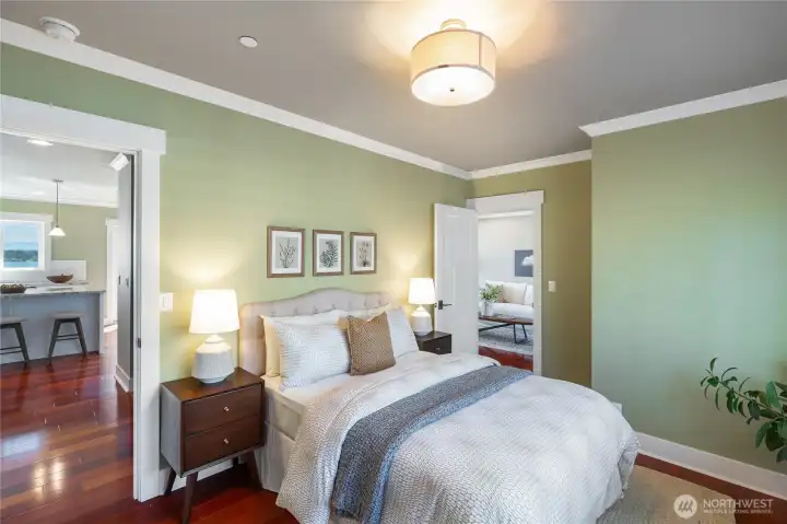 The main level also offers a convenient bedroom and bathroom ideal for guests or multi-generational living.