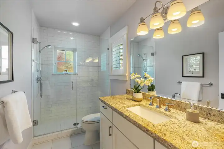 Main level three-quarter bathroom.