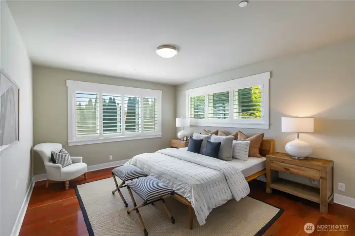 The lower level offers a primary suite wing with a generous walk-in closet and spa inspired ensuite bath with soaking tub, double rain shower, double vanites, private WC and plenty of storage.