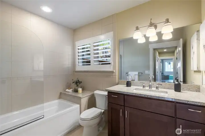 Full bathroom shared between the two, lower level bedrooms.