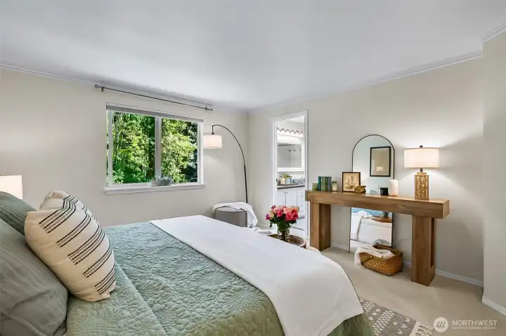 Window overlooks wooded greenbelt and offers total privacy