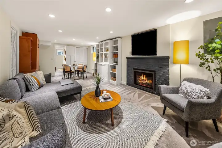 Lower level rec room is spacious, features built-ins and is a spa. Lower level rec room is spacious, features built-ins and is a spa.