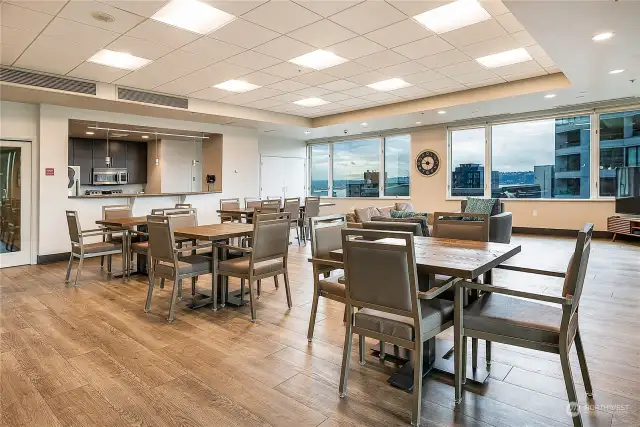 7th Floor amenities are numerous!, including this huge community room with kitchen...and Views of water, space needle and science center