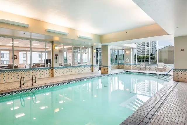 An indoor pool for you to use at any time, surrounded by natural light and views.  Not seen in this photo- a hot tub!