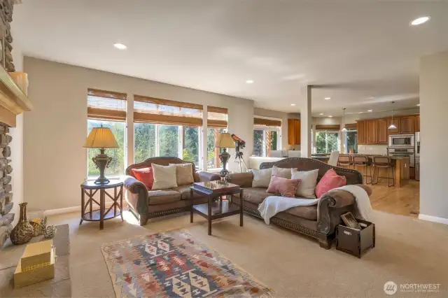 Living room open to dining and kitchen