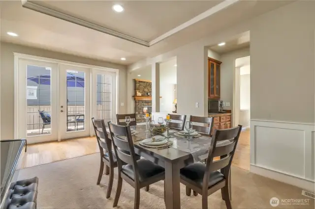 Formal dining with access to private side deck