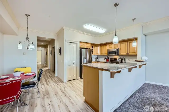 Kitchen includes a built-in breakfast bar for extra seating