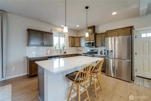 Great eating space at this large island with storage