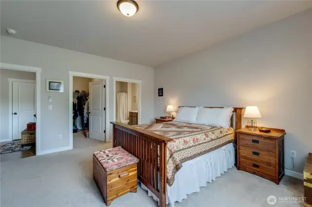 Primary bedroom with bathroom (right) and WIC (center). Left door is to the bedroom door.