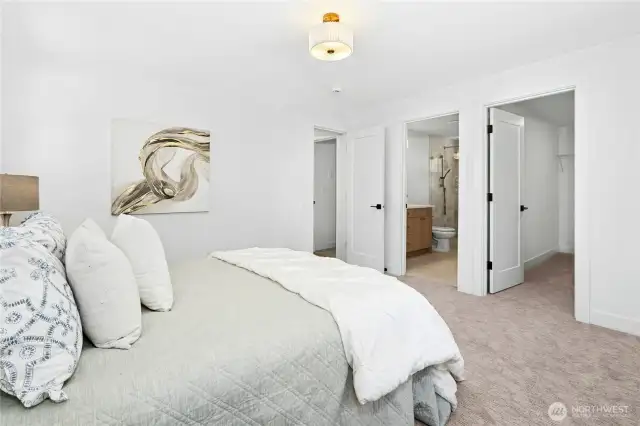 another view of the Primary bedroom with a peek towards both the bath and closet.