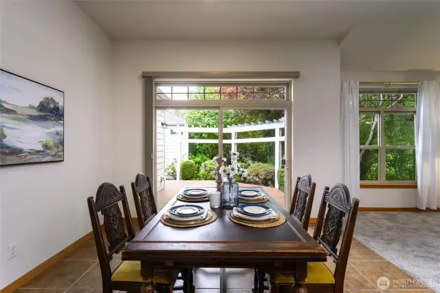 The oversized sliding door in the dining room leads to the outdoor deck.  Perfect for alfresco dining.