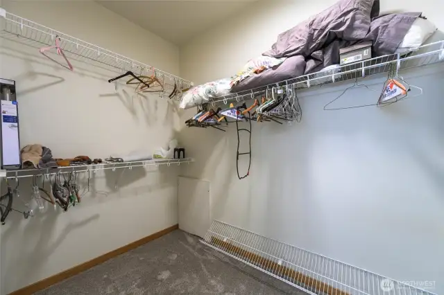 Walk in closet just off the primary bathroom
