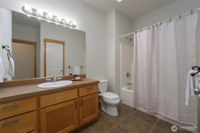 2nd bathroom with shower/bath combo.