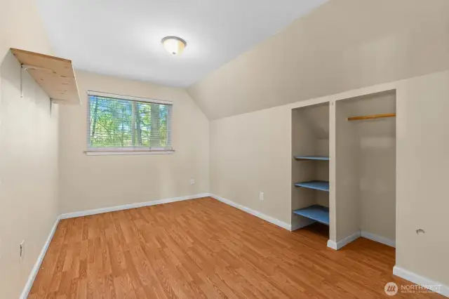 Flexible studio space above the garage.