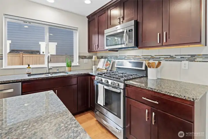 Kitchen with stainless steel gas stove