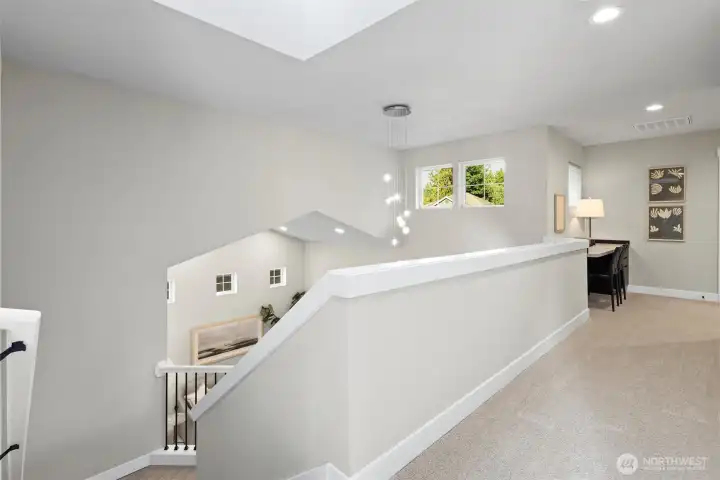 Upstairs landing, view from primary bedroom to the other 3 bedrooms on same floor