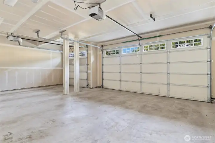 Large 3 car garage with overhead storage