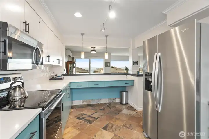 Enjoy the view of the bay while cooking. Kitchen has lots of counter space.