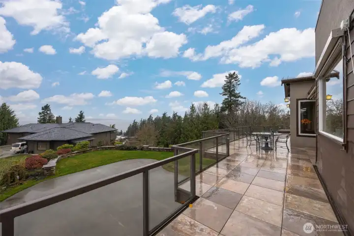 The tiled, wraparound deck is expansive and perfect for entertaining!