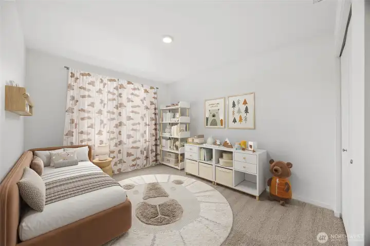 One of 4 bedrooms upstairs.  Virtually Staged.