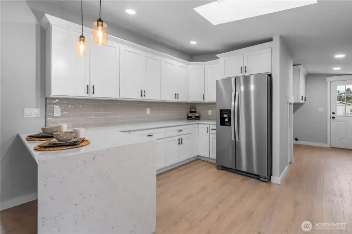 Elegant Waterfall Countertop Feature