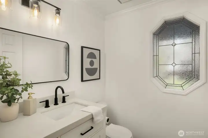 Powder room on main is beautifully updated