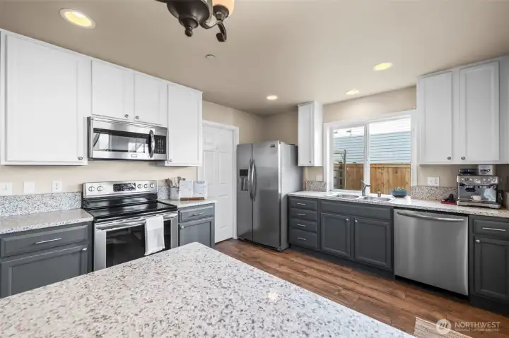 The door opens to a pantry/laundry room.