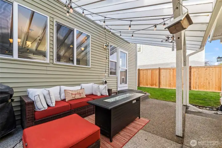 Covered exterior space is so valuable in the PNW, and this one offers room to relax, dine, and grill.