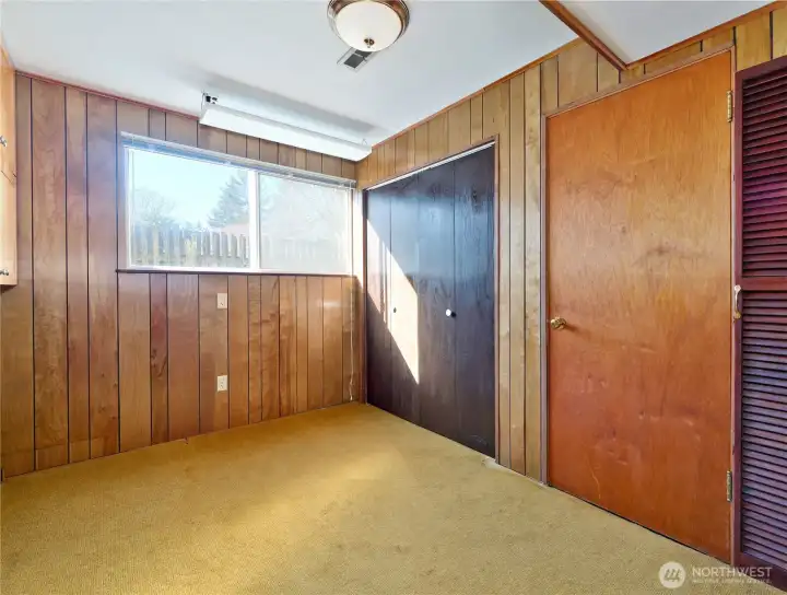 Lower level bedroom 5 with Murphy bed.