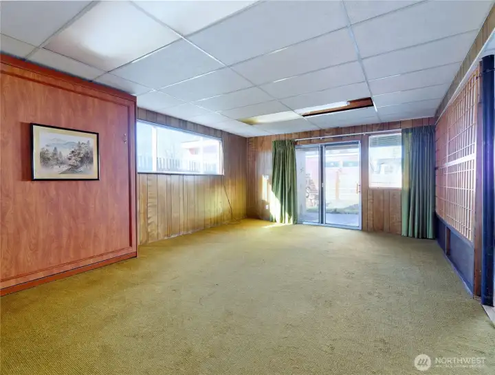 Rec room opens to backyard.