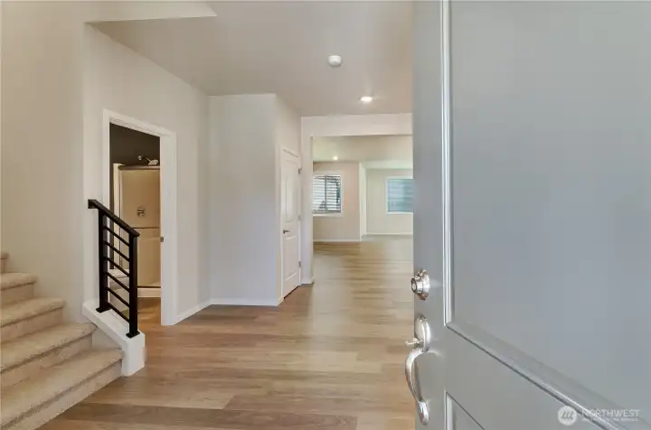 Photos are taken of a Shelby plan previously built in the community.