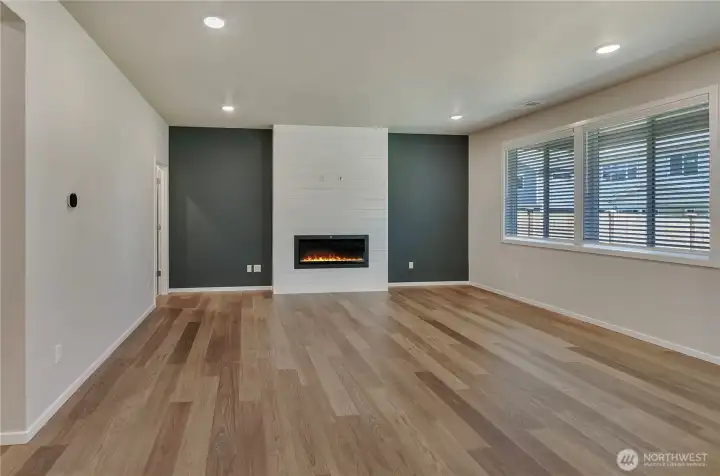 Photos are taken of a Shelby plan previously built in the community.