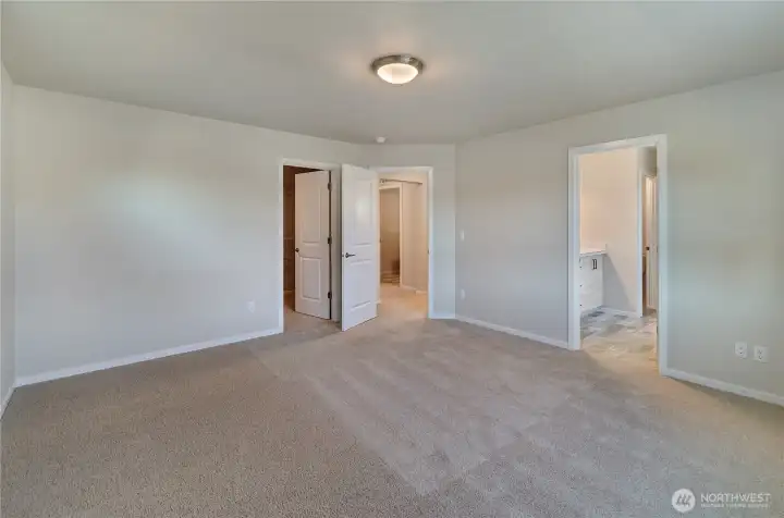 Photos are taken of a Shelby plan previously built in the community.