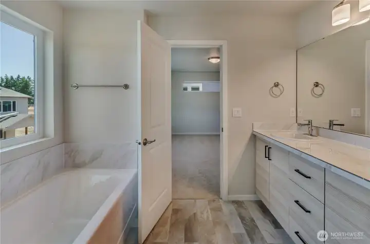 Photos are taken of a Shelby plan previously built in the community.