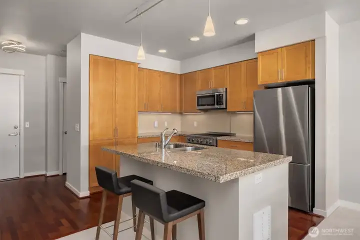 Newly updated appliances and thoughtful finishes make the kitchen both stylish and functional.