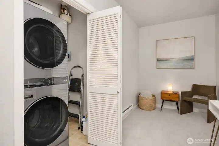 An in-unit washer and dryer—both new—add everyday ease and convenience.