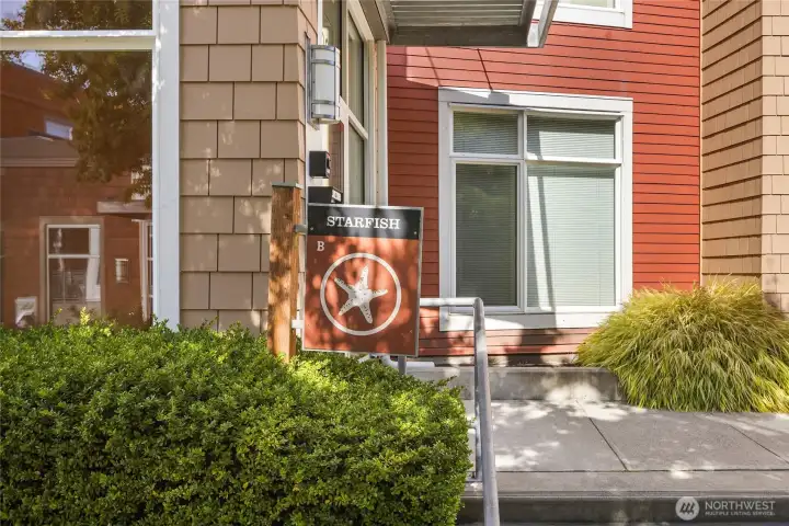 Secure entry and well-kept grounds contribute to Harbor Square’s polished appeal.