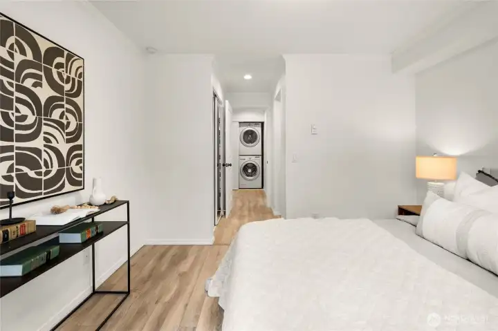 Hallway off the primary bedroom allows for separation from living space - rare to find in a 1br condo.