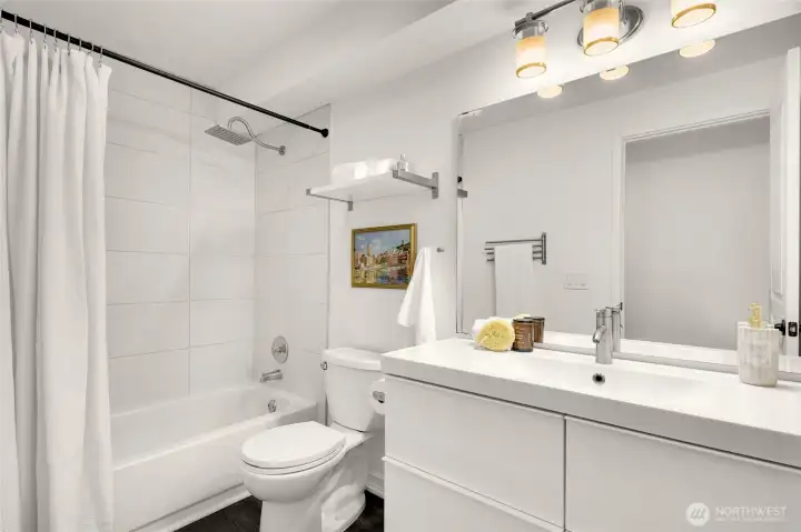 Updated bright bathroom with high end finishes.
