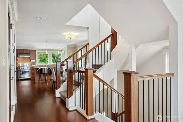 This home lives like a 2 story home with a street level entry to maximize the views. Quality resonates throughout.