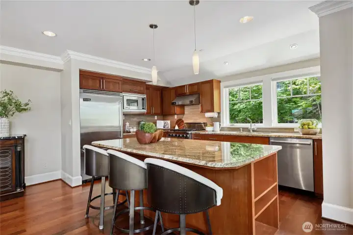 Wolf gas range, Viking refrigerator and microwave, Bosch dishwasher, slab granite counters...all top of the line, just like the rest of the home.