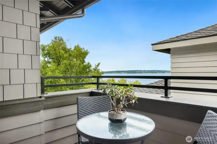Deck off living room is perfect for all day/night dining.