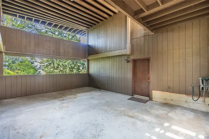 Covered patio could become a basketball court, mini-pickleball or a dance floor??