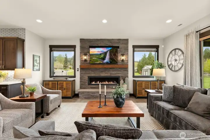 Show-stopper fireplace with several settings anchors this Great Room