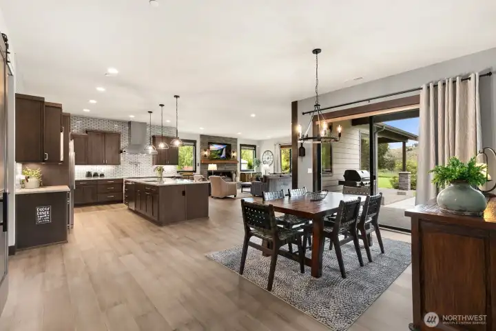 Dining room with sliding glass door that leads to second covered patio