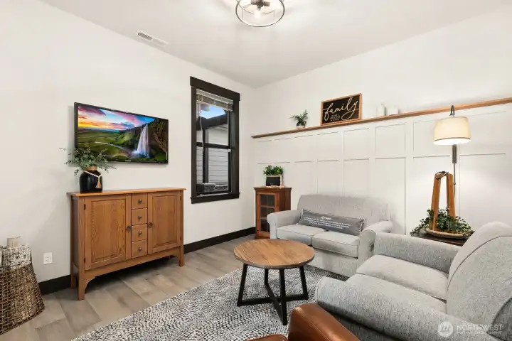 This den is off the Great Room and is used as a TV room but could easily be an office