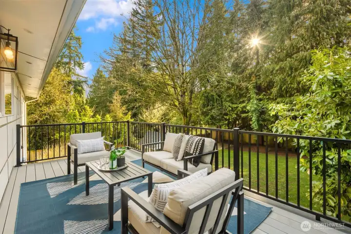 Off the slider on main floor— enormous backyard.